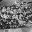 Strathpeffer, general view, showing Strathpeffer Free Church and Highland Hotel.  Oblique aerial photograph taken facing north.
