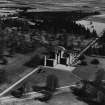 Glamis Castle and Estate.  Oblique aerial photograph taken facing north-east.  This image has been produced from a print.