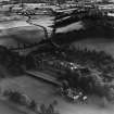 Abbotsford House and Grounds, Melrose.  Oblique aerial photograph taken facing east.  This image has been produced from a print.