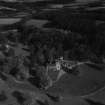 Ballindalloch Castle and Stables.  Oblique aerial photograph taken facing north.  This image has been produced from a print.