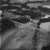 Leaderfoot Viaduct and Road Bridge, Leaderfoot.  Oblique aerial photograph taken facing east.  This image has been produced from a print.