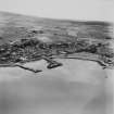 Campbeltown, general view, showing Campbeltown Harbour and Kinloch Public Park.  Oblique aerial photograph taken facing west.  This image has been produced from a print.