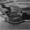 Aros Castle and Aros Mains Farm, Mull.  Oblique aerial photograph taken facing west.  This image has been produced from a print.