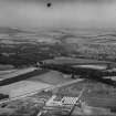 Dobbie and Co. Melville Nurseries, Gilmerton Road, Edinburgh.  Oblique aerial photograph taken facing east.  This image has been produced from a print.