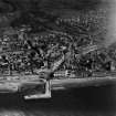 Largs, general view, showing Clark Memorial Church, Bath Street and Largs Pier.  Oblique aerial photograph taken facing east.  This image has been produced from a print.