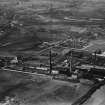 Rutherglen, general view, showing Clyde Paper Co. Ltd. Clyde Paper Mills, Eastfield and Farmeloan Road.  Oblique aerial photograph taken facing west.  This image has been produced from a print. 