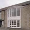 NE Side. Bay window. Detail.