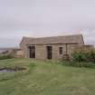 View of garden outbuilding from W