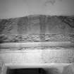 Interior. Ground floor hall detail of inscribed resited pediment including "FRUSTRA"