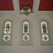 Interior. S transept stained glass windows of SS John, Andrew and Paul