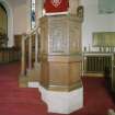 Interior. View of pulpit carved by Helen Wilson c.1920
