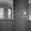Interior. View of entrance porch showing ladder access to tower