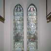 Interior. E wall detail of stained glass windows depicting the Resurection and Ascension 1923