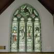 Interior. N gable detail of Andrew Carnegie Memorial stained glass window with figures of Music, Literature, Loving Kindness and Peace by Percy Bacon 1923