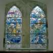 Interior. W wall detail of Rev J Martin memorial stained glass windows of fishing scenes by Roland Mitton 1987