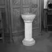 Interior. Detail of carved stone font