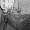 View from SW of alley between bolier house and engine room.
