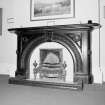 Interior, dining room, detail of black marble fireplace