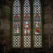 Interior. Detail of section of stained glass in tripartite window