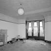 Interior. View of drawing room from N (fireplace removed for security)