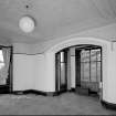 Interior. View of drawing room from NE (fireplace removed for security)