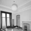 Interior. View of library from NNE (fireplace removed for security)