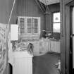 Interior. View of butler's from W showing original cabinets