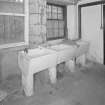 Interior. View of wash house from NW