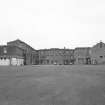 General view from N showing the rear of the original school with the former chapel to the W