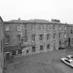Elevated view from NNE of rear of original school