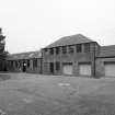 View of W service buildings from ENE