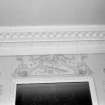 First floor drawing room, detail of plasterwork over the mirror.