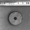 Spindle whorl from Craig Phadrig 1971 excavation. Scale in cms. In MS7262/5