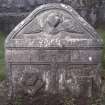 View of headstone dated 1707 with winged soul,  Logie Old Churchyard.