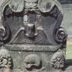 Detail of headstone dated 1782 with green man, wings and skull , Holy Rude, Stirling.