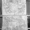 Photographic copy of two rubbings. The top rubbing shows upper detail of reverse of Pictish cross slab, originally from Woodrae Castle, Angus, now at National Museums of Scotland. The bottom rubbing shows detail of reverse of Aberlemno no.2 Pictish cross slab, Aberlemno Churchyard, Angus.