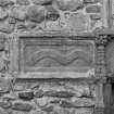 Detail of dexter panel of sacrament house, bearing inscribed scroll, now illegible.