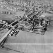 Denny, general view, showing Cruikshank and Co, Ltd, Denny Iron Works, Glasgow Road and Paris Avenue,   Mydub, Denny, Stirlingshire, Scotland, 1950. Oblique aerial photograph taken facing north.  This image has been produced from a crop marked negative.