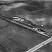 George Bennie Railplane test track, Milngavie, New Kilpatrick, Dunbartonshire, Scotland, 1930. Oblique aerial photograph taken facing south-east.  This image has been produced from a marked negative.