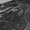 Edinburgh, general view, showing Edinburgh Dock and Baltic Street. Leith, Edinburgh, Midlothian, Scotland, 1932.  Oblique aerial photograph taken facing east.  This image has been produced from a print.