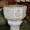 Font from Kinkell Old Parish Church now in St John's Episcopal Church, Aberdeen.
Detail of panels displaying a) shield charged with the Crown of Thorns suspended from the Cross, and b) the crowned monogram IHS.
