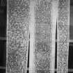 Photographic copy of three rubbings. The middle rubbing depicts the front shaft of Keills Cross. The left and right rubbings shows the left and front side of Thornhill cross.