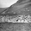 A detail of a section of wall of the enclosures at An Lag Bho'n Tuath, St Kilda.