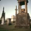 General view of Glasgow Necropolis with large pedestal  monument in foreground.