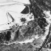 Oblique aerial view of Crichton Castle in snow.