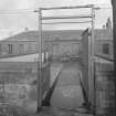 View of yard and gates from SW.