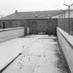 View of yard from SW.