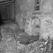 Interior.
Feed room, detail of ash traps.