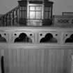 Interior.
Preaching auditorium, detail of panelled rail.