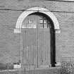 Edinburgh, Granton Gasworks, Engine shed/ mechanics workshop
Detail of arched doorway in W frontage